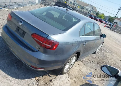 2016 Volkswagen Jetta 1.8T Sel z USA, uszkodzony, nr VIN 3VWL17AJ6GM228440